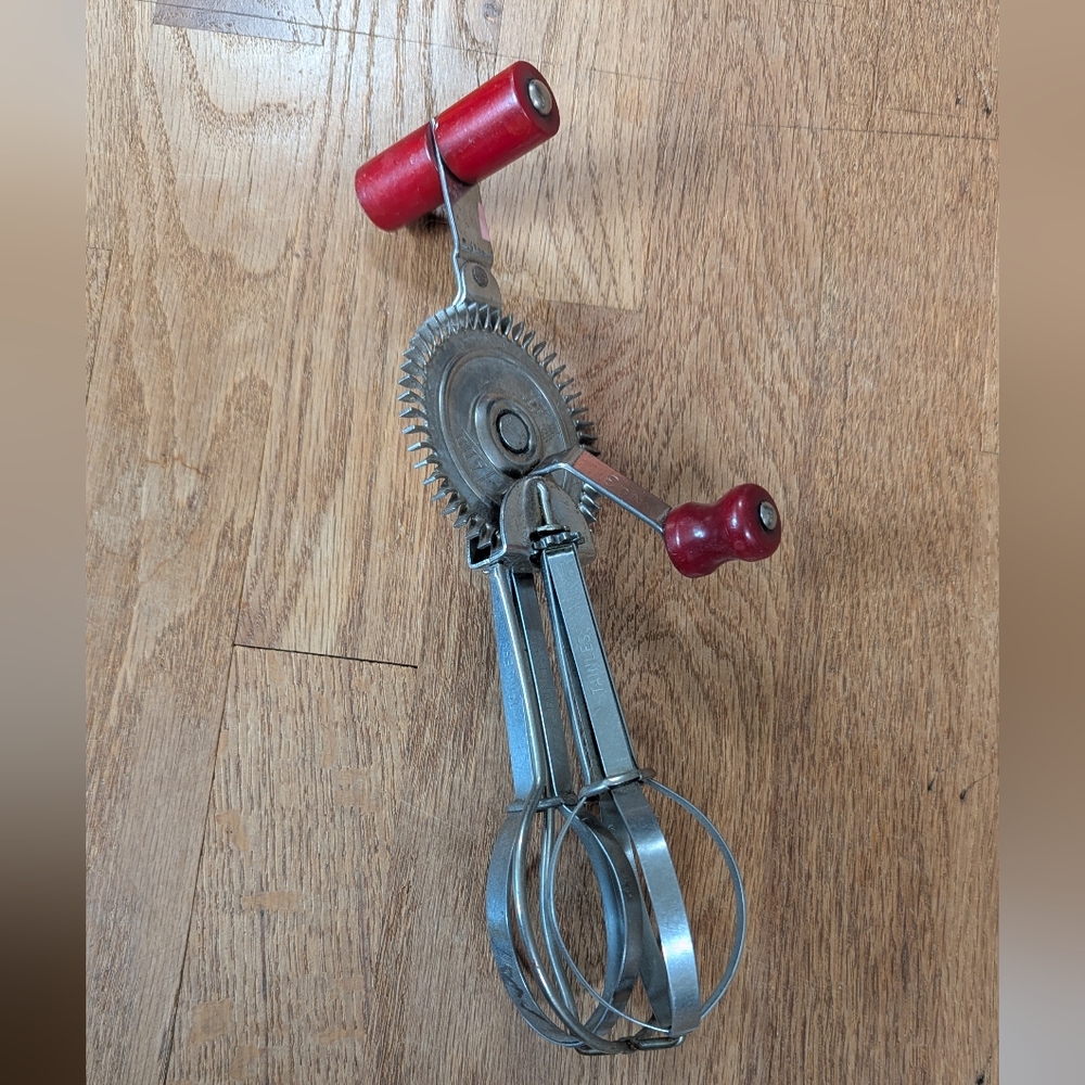 Retro Handheld Egg Beater with Red Accents